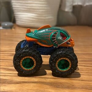 Monster Truck with Green and Orange Design
